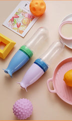 NomNom™ Silicone Baby Feeding Bottle with Spoon