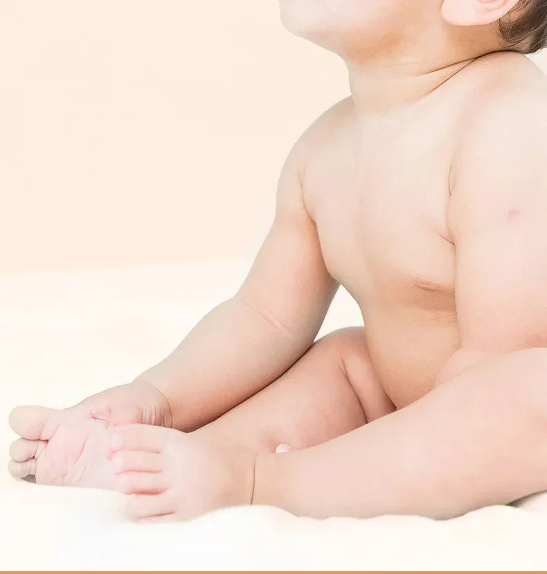 NomNom™ Silicone Baby Feeding Bottle with Spoon