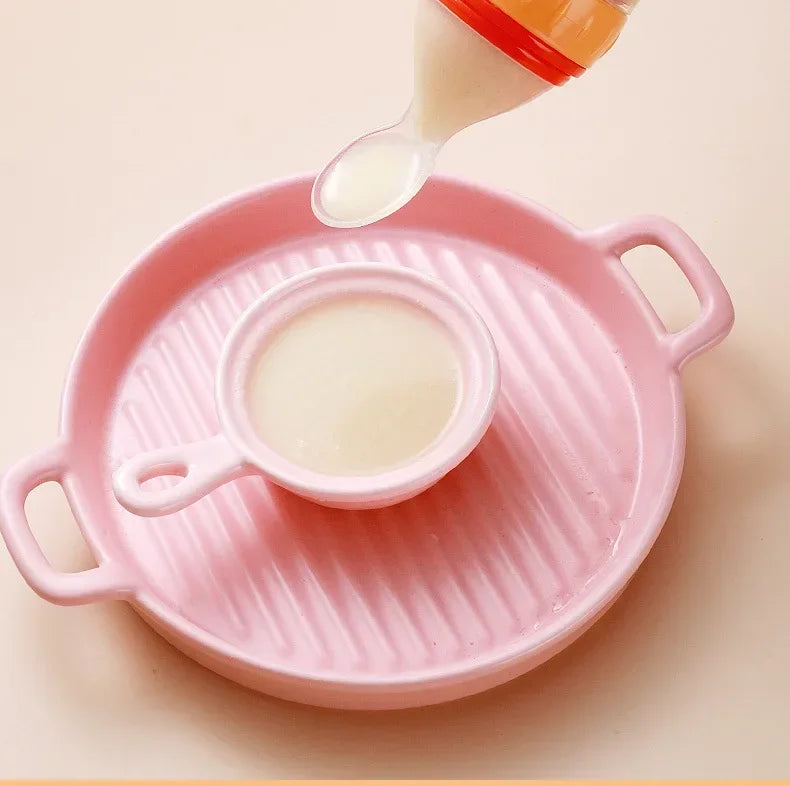 NomNom™ Silicone Baby Feeding Bottle with Spoon