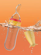 NomNom™ Silicone Baby Feeding Bottle with Spoon