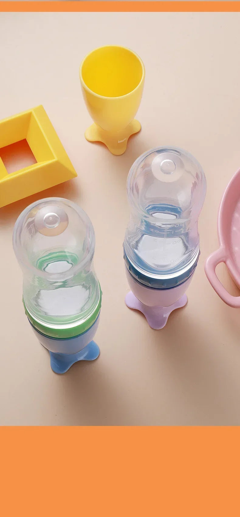 NomNom™ Silicone Baby Feeding Bottle with Spoon